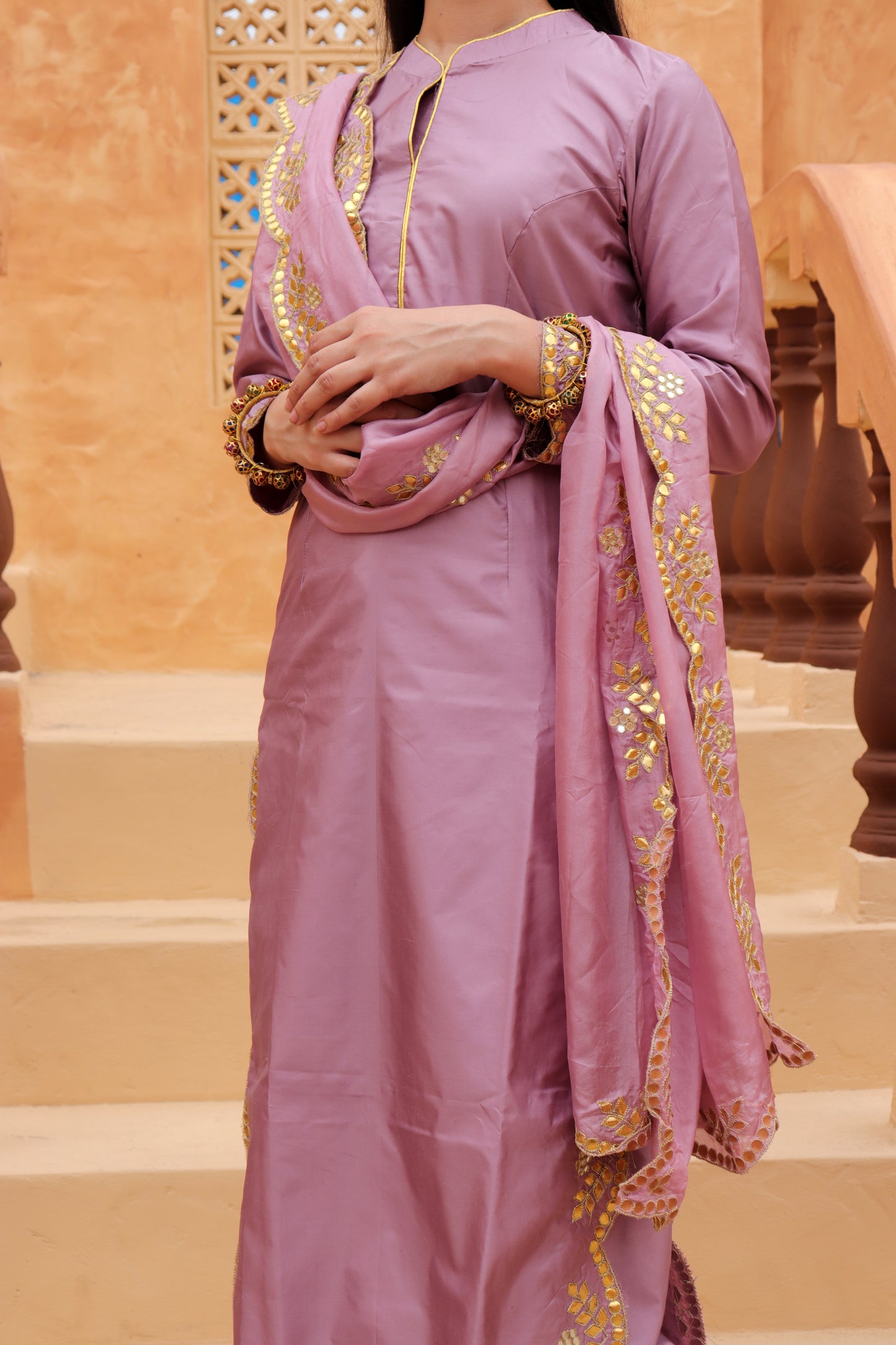 Intricately woven with cultural heritage, our outfits from our latest festive collection with pastel shades.