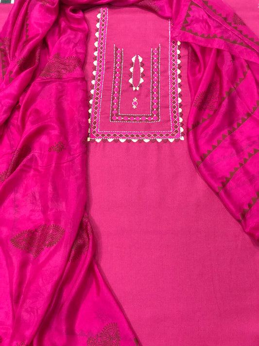 Winter special: 3 piece Hot pink coloured suit intricately hand-blocked with a touch of thread on it